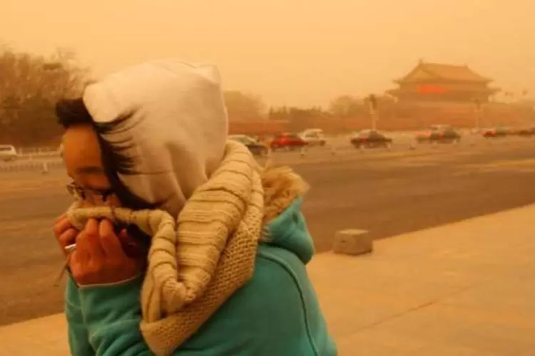 Tempestade de areia na China: encontros sobre o clima costumam servir para boas fotos — e pouco mais (Feng Li/Getty Images)