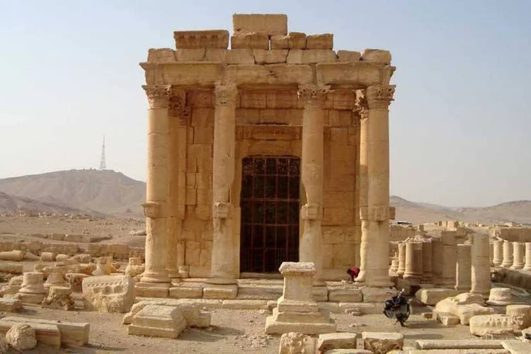 
	Ru&iacute;nas de templo hist&oacute;rico em Palmira, na S&iacute;ria: &quot;podemos confirmar a destrui&ccedil;&atilde;o do pr&eacute;dio principal do Templo de Bel, assim como uma s&eacute;rie de colunas&quot;
 (REUTERS/Stringer)