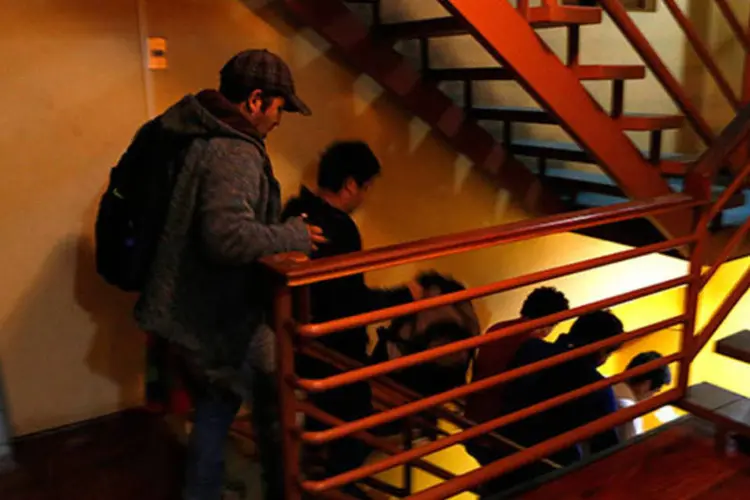 
	H&oacute;spedes de hotel evacuam rapidamente durante novo terremoto de 7,6 graus: a presidente chilena, Michele Bachelet, precisou ser retirada do hotel em que estava hospedada&nbsp;
 (REUTERS-Ivan Alvarado)