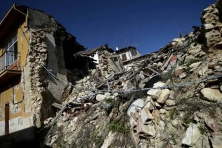 
	Edifica&ccedil;&otilde;es destru&iacute;das pelo terremoto de 2009 na It&aacute;lia: o terremoto que deixou mais de 80 mil desabrigados continua sendo um trauma para todos os italianos
 (Filippo Monteforte/AFP)