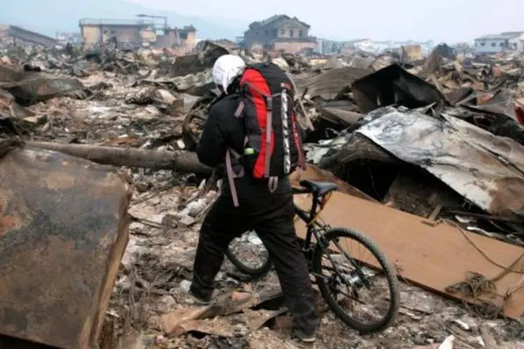 Destroços no Japão após terremoto e tsunami: reconstruir casas será papel do governo (Getty Images)