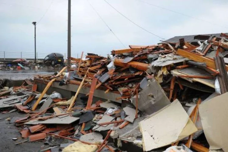 O Japão viveu um drama no dia 11 de março, quando um terremoto de 9 graus e um tsunami brutal mataram 28 mil pessoas (Koki Nagahama/Getty Images)