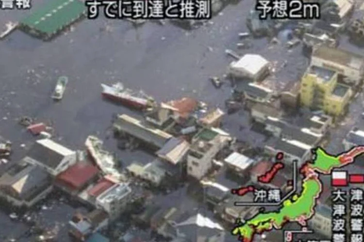 Imagens aéreas da TV japonesa mostram Fukushima tomada pelas águas (AFP)