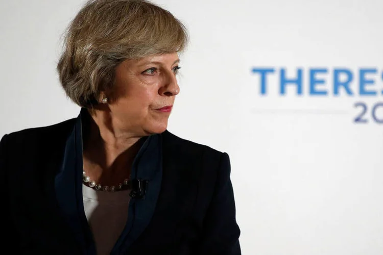 
	Theresa May: ambos concordaram que os v&iacute;nculos entre os dois pa&iacute;ses &quot;se desenvolveram de forma positiva&quot; desde a assinatura do acordo entre Ir&atilde; e grandes pot&ecirc;ncias
 (Andrew Yates / Reuters)