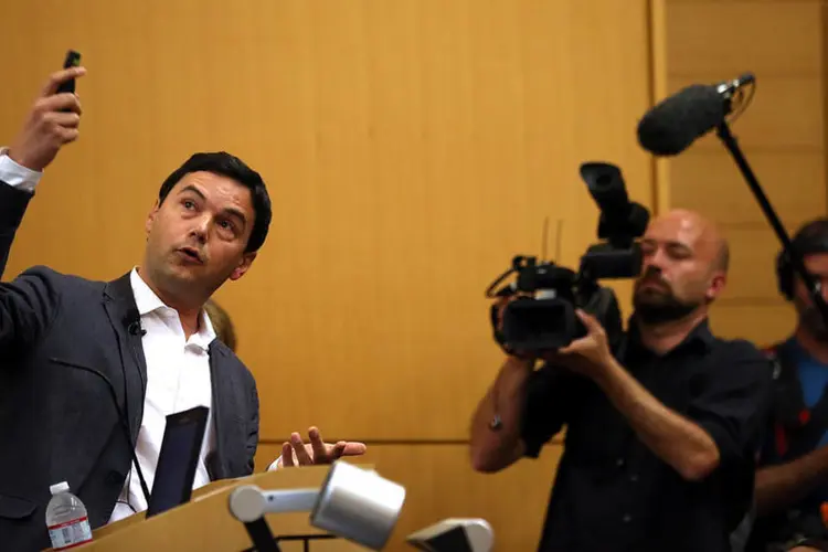 
	Thomas Piketty em apresenta&ccedil;&atilde;o na Calif&oacute;rnia em abril de 2014: autor virou celebridade
 (Justin Sullivan/Getty Images)