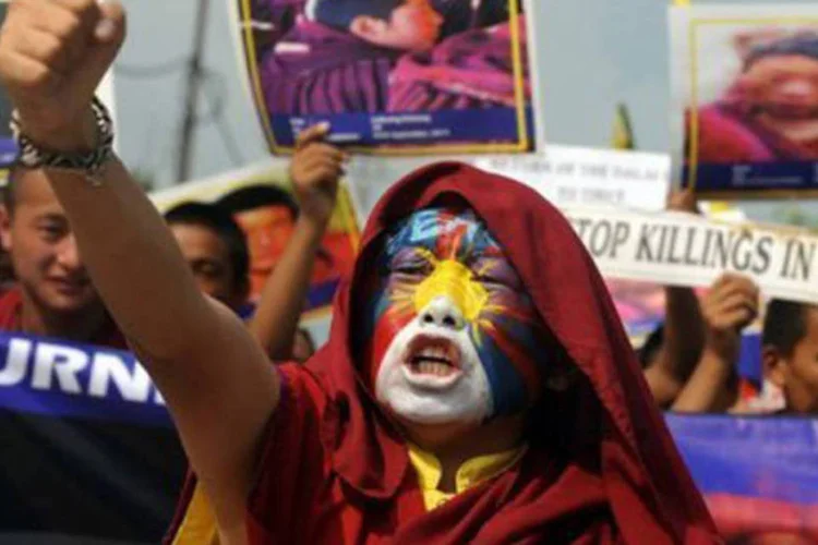 Prosseguem na região os protestos contra a repressão cultural e religiosa de Pequim, apesar da forte pressão das forças de segurança chinesas (Diptendu Dutta/AFP)