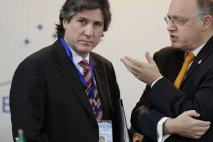 Chanceler da Argentina, Héctor Timerman, à direita, com o ministro da Economia do país, Amado Boudou (Juan Mabromata/AFP)
