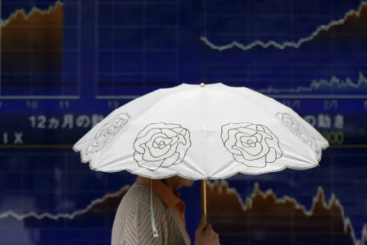 
	Bolsa de T&oacute;quio: mercados asi&aacute;ticos tiveram um dia misto com o &iacute;ndice japon&ecirc;s Nikkei recuperando uma pequena parte de suas recentes perdas
 (REUTERS/Toru Hanai)