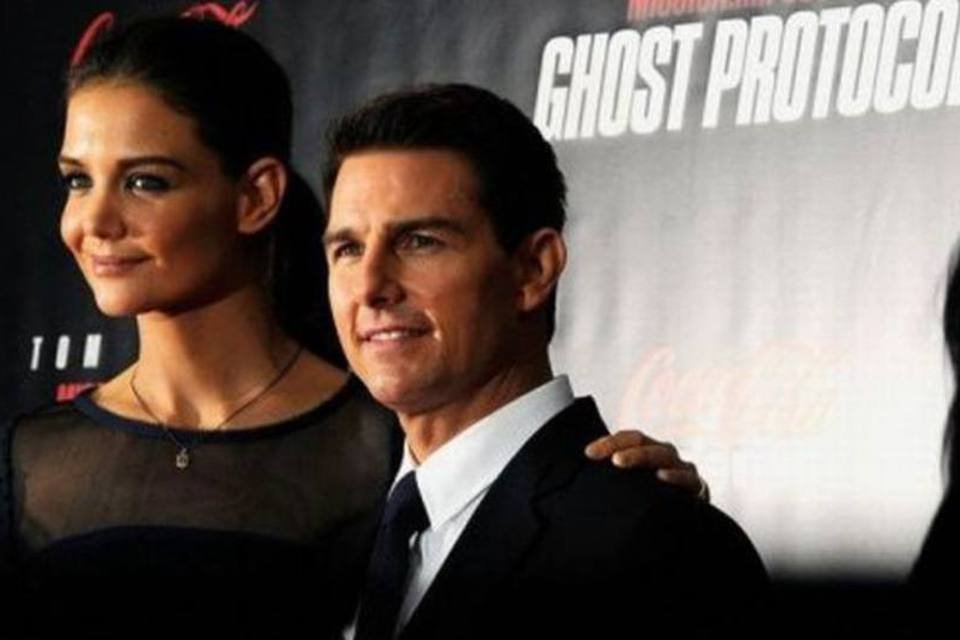 
	Tom Cruise ao lado da ex-esposa Katie Holmes no lan&ccedil;amento de &quot;Miss&atilde;o Imposs&iacute;vel&quot; em dezembro passado
 (Andrew H. Walker/Getty Images/AFP)