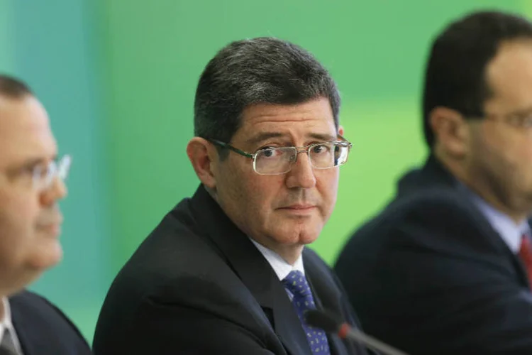 Tombini, Levy e Barbosa: "Desejamos aos novos ministros êxito no trabalho", afirma presidente da CNI (Ueslei Marcelino/Reuters)