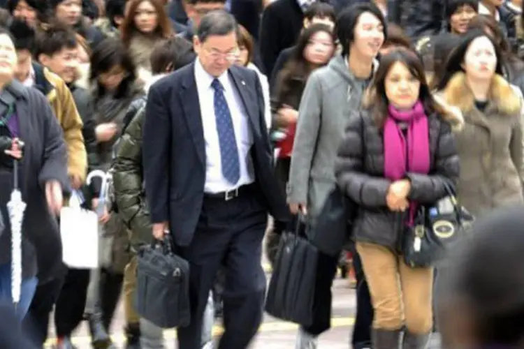 Economia japonesa deve se contrair em 0,7%; a previsão anterior era de crescimento de 1,4% (Yoshikazu Tsuno/AFP)