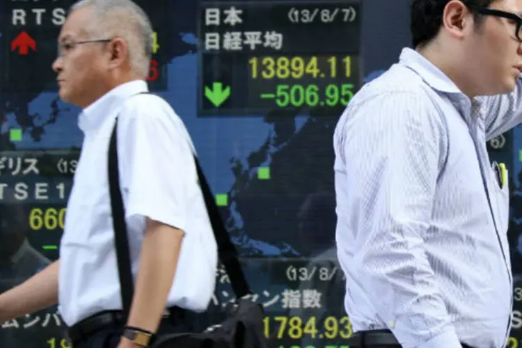 
	Bolsa de T&oacute;quio: o &iacute;ndice Nikkei, que re&uacute;ne as empresas mais negociadas na capital japonesa, encerrou o dia com alta de 0,73%, a 18.466,92 pontos
 (Tomohiro Ohsumi/Bloomberg)