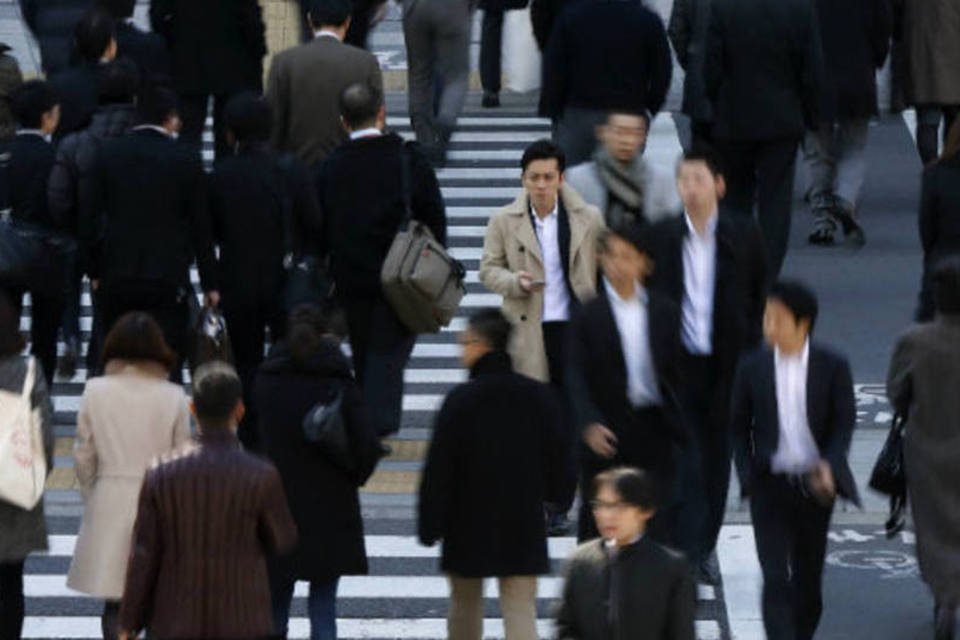Japão eleva avaliação da economia doméstica