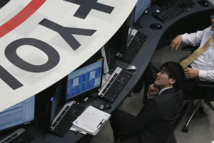 
	Bolsa de T&oacute;quio: o &iacute;ndice Nikkei ganhou 1,2% e terminou a sess&atilde;o com 14.311,98 pontos
 (REUTERS/Toru Hanai)