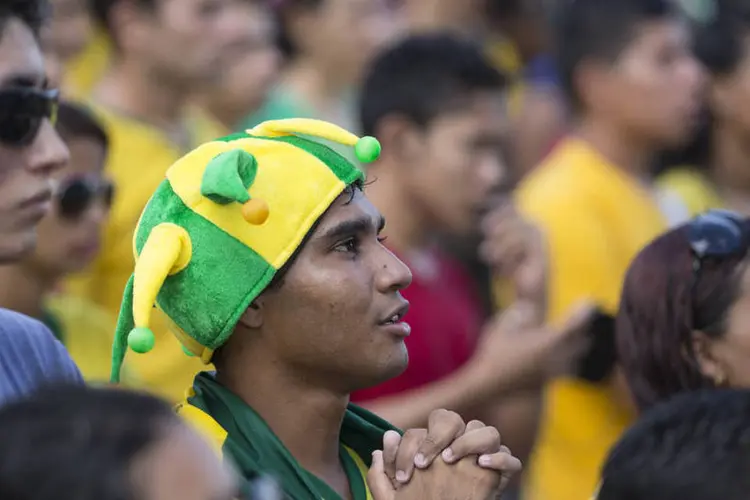 
	Torcedores assistem ao jogo do Brasil contra o M&eacute;xico durante a Fifa Fan Fest de Manaus
 (Oli Scarff/Getty Images)