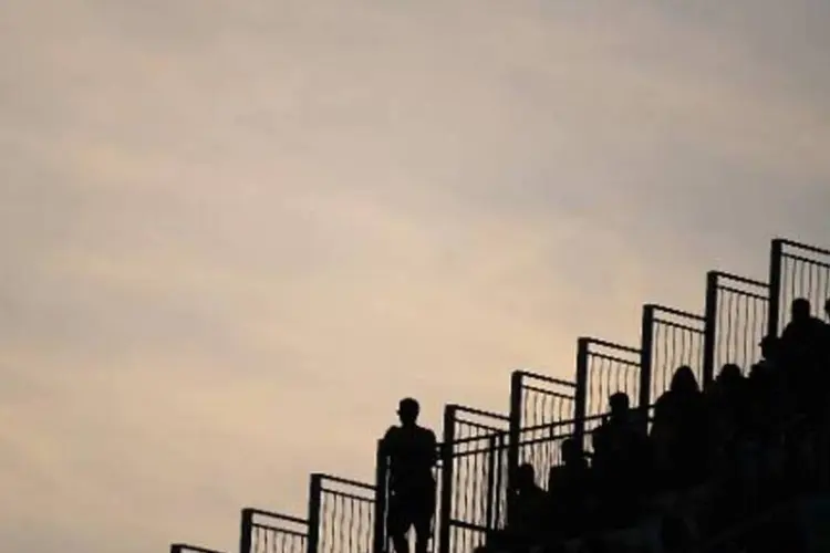 Torcedores são vistos em partida entre Coreia do Sul e Bélgica, na Arena Cortinthians (Odd Andersen/AFP)