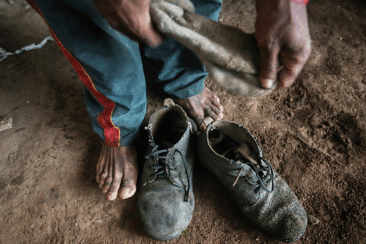 
	Pobreza: trabalhadores que ganham menos de um sal&aacute;rio m&iacute;nimo foram os mais prejudicados pela crise
 (Mario Tama/Getty Images)