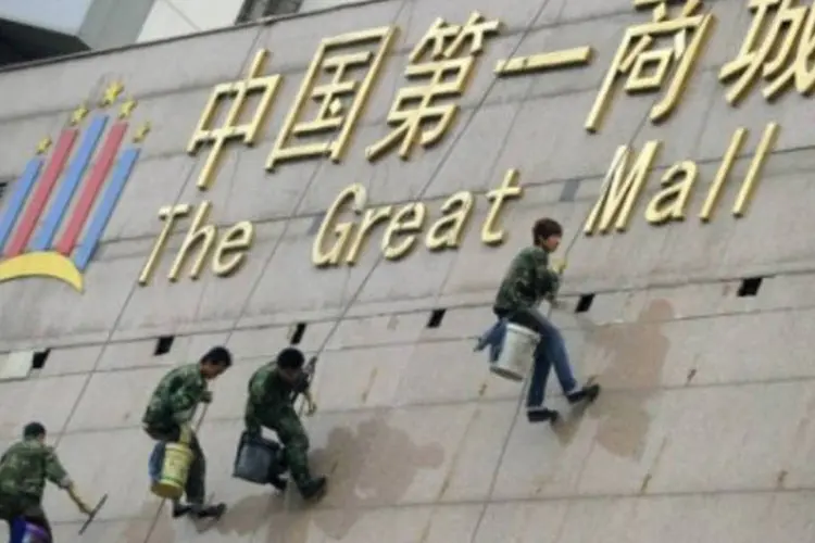 Partcipação da China na economia mundial vai ser de 11,4% em 2015 (AFP/Liu Jin)