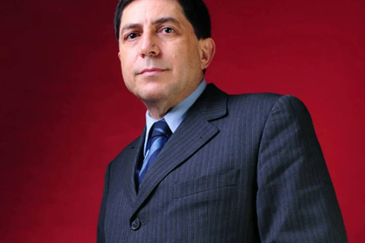 
	Luiz Carlos Trabuco, do Bradesco: &quot;a economia brasileira est&aacute; em processo de transi&ccedil;&atilde;o. Quando chegarmos em dezembro poderemos comemorar bases e n&atilde;o o PIB&quot;
 (Germano Luders)