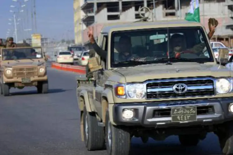 Tropas curdas: peshmergas desembarcaram nesta madrugada no aeroporto de Sanliurfa (AFP)