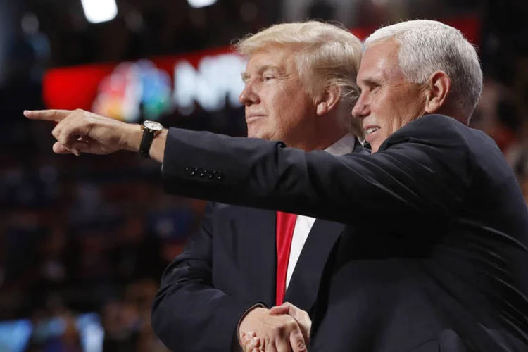 
	Pence e Trump: a tarefa de Pence &eacute; mais dif&iacute;cil, ele deve suavizar as grosserias de Trump e limitar seus estragos
 (Jonathan Ernst / Reuters)