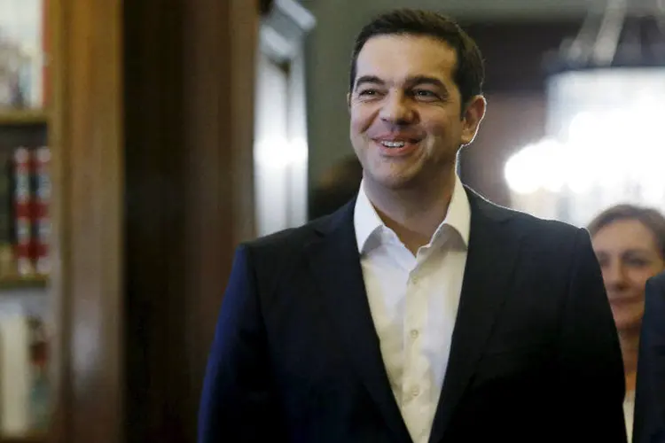 
	Tsipras: &quot;Temos a obriga&ccedil;&atilde;o de implementar rapidamente o acordado&quot;, disse Tsipras aos membros de seu executivo, em seu primeiro conselho de ministros
 (REUTERS/Alkis Konstantinidis)