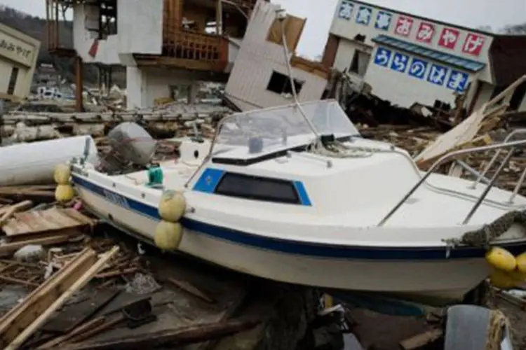 
	O terremoto e o tsunami que atingiram o Jap&atilde;o em mar&ccedil;o de 2011: o terremoto de hoje poderia ser uma r&eacute;plica do evento, j&aacute; que o epicentro foi situado muito perto do anterior
 (Nicolas Asfouri/AFP)