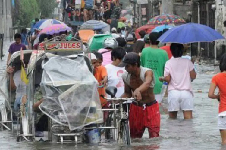 Filipinas: inundações que castigam o norte do arquipélago causaram pelo menos 49 mortes (Jay Directo/AFP)