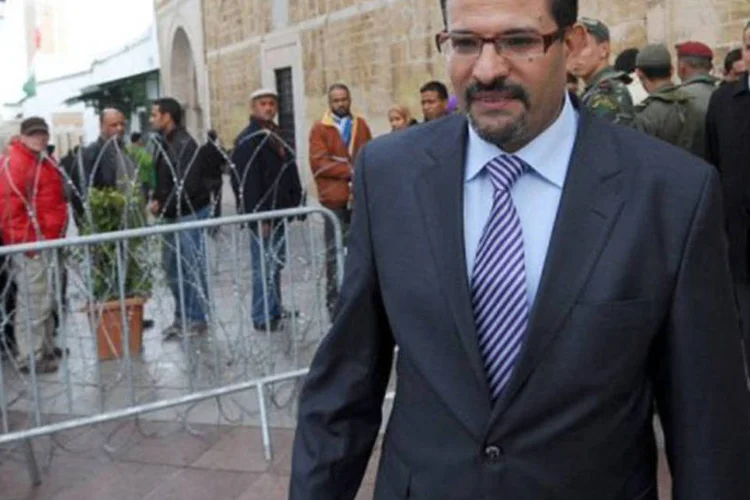O ministro das Relações Exteriores da Tunísia, Rafik Abdesalem, chega ao Ministério em Túnis em 9 de janeiro
 (Fethi Belaid/AFP)