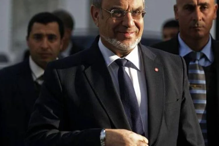
	Jebali chega &agrave; rodada de consultas com outros partidos: ele j&aacute; indicou que, se n&atilde;o obtiver o apoio da classe pol&iacute;tica, iria renunciar neste s&aacute;bado
 (AFP/ Gianluigi Guercia)