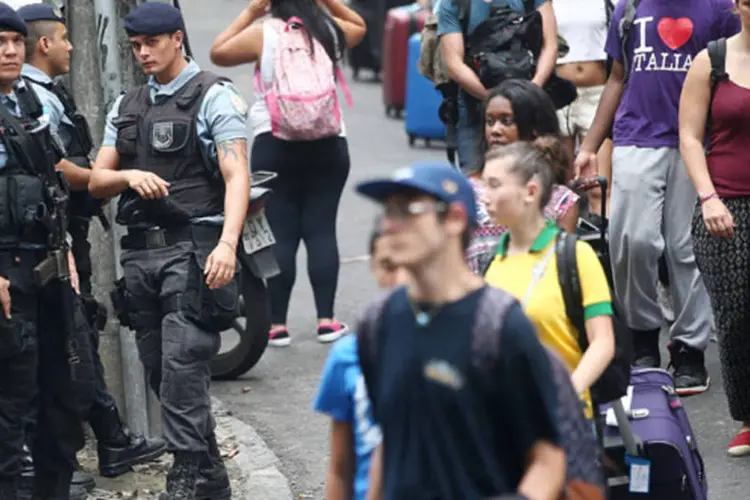 
	Pol&iacute;cia Federal barrou 371 estrangeiros com hist&oacute;rico de viol&ecirc;ncia que pretendiam assistir aos jogos da Copa do Mundo
 (Mario Tama/Getty Images)