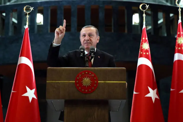 
	Tayyip Erdogan: &quot;Vamos ajudar nossos amigos s&iacute;rios&quot;
 (Murat Cetinmuhurdar / Reuters)