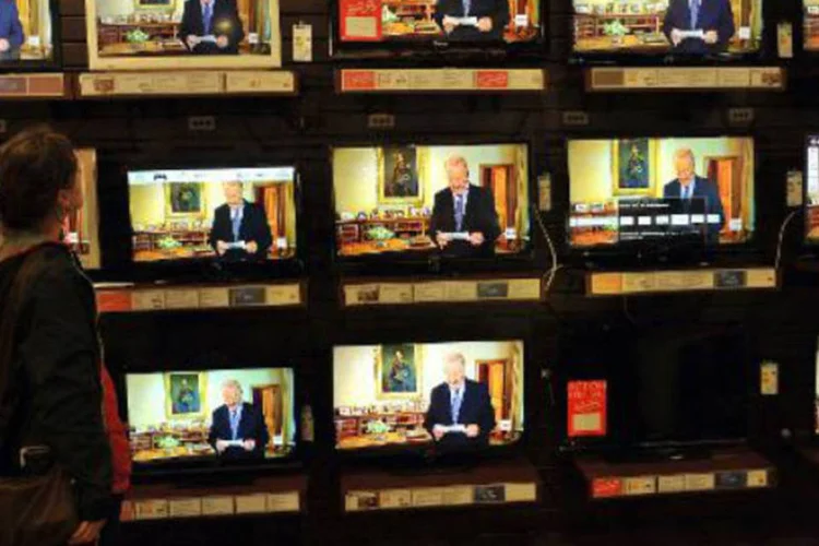 
	TVs: o modelo tradicional da TV paga est&aacute; amea&ccedil;ado pelo r&aacute;pido crescimento de outros servi&ccedil;os concorrentes
 (AFP)