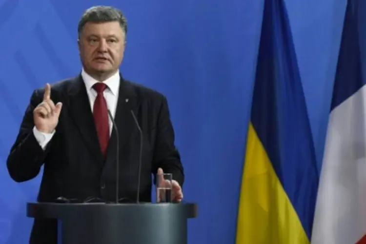 
	Petro Poroshenko: &quot;a Ucr&acirc;nia necessita agora n&atilde;o de armamento letal, mas potencial para uma defesa efetiva de seu territ&oacute;rio, a defesa de sua integridade territorial, sua soberania e sua independ&ecirc;ncia&quot;
 (Tobias Schwarz/AFP)