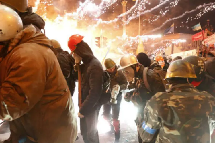 
	Manifestantes em Kiev: segundo ministro da Sa&uacute;de checo, 24 pacientes em &quot;em condi&ccedil;&otilde;es muitos s&eacute;rias a cr&iacute;ticas&quot; ser&atilde;o tratados em dois hospitais de Praga
 (REUTERS/Vasily Fedosenko)