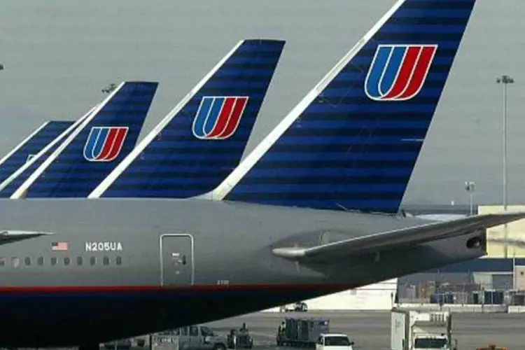 
	Avi&otilde;es da United Airlines: consultores da ind&uacute;stria dizem que o impacto de falhas tecnol&oacute;gicas continuar&aacute; crescendo
 (John G. Mabanglo/AFP)