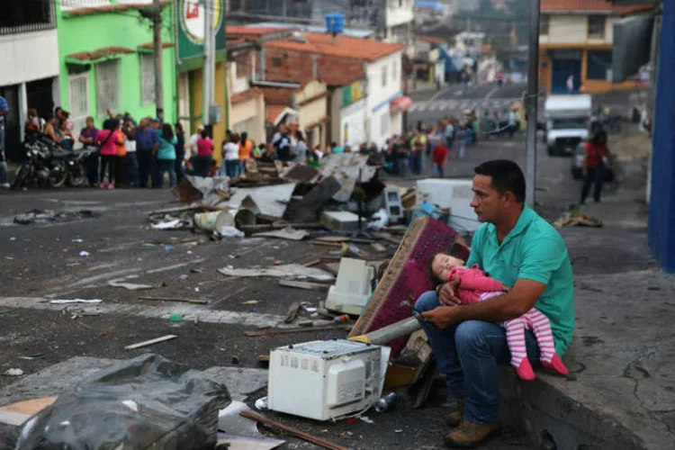 Venezuela em crise: país dono das maiores reservas de petróleo do mundo vive turbulências políticas e econômicas que parecem não ter data para acabar (John Moore / Staff)