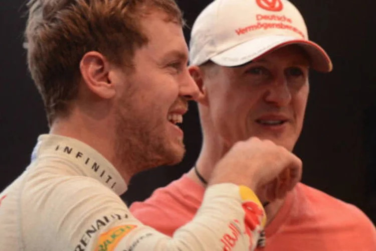 Sebastian Vettel e Michael Schumacher: atual campeão de Fórmula 1 lamenta acidente do amigo e ídolo (PORNCHAI KITTIWONGSAKUL/Getty Images)