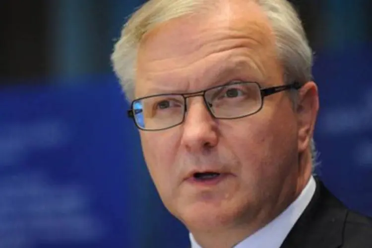 
	Olli Rehn: &quot;Esperamos uma recupera&ccedil;&atilde;o a partir do in&iacute;cio do pr&oacute;ximo ano, e teremos uma economia mais robusta em 2014&quot;, disse o vice-presidente da CE
 (©AFP / John Thys)