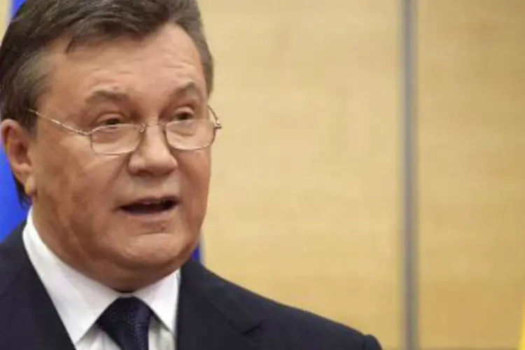 Viktor Yanukovich, presidente destituído da Ucrânia: "continuo sendo não apenas o único presidente legítimo da Ucrânia, mas também o comandante em chefe" (Alexander Nemenov/AFP)
