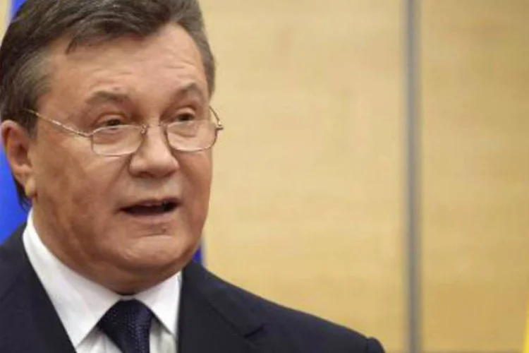 
	Viktor Yanukovich: ele foi destitu&iacute;do em fevereiro do ano passado ap&oacute;s v&aacute;rias semanas de protestos populares
 (Alexander Nemenov/AFP)