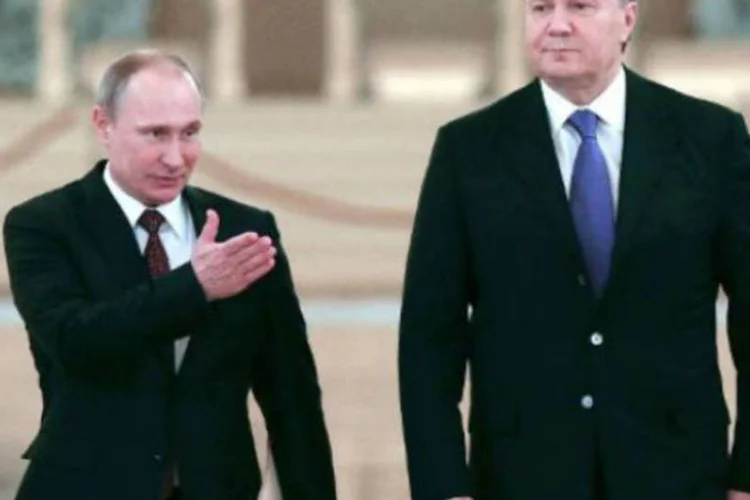 
	Viktor Yanukovich e Vladmir Putin: desde domingo, mais de 1.700 pessoas ficaram feridas em Kiev nos confrontos entre manifestantes e a pol&iacute;cia, segundo a oposi&ccedil;&atilde;o
 (AFP)