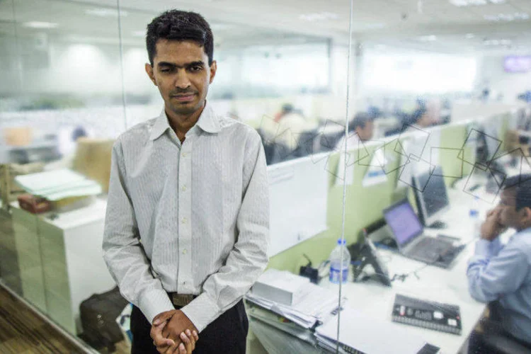 Vishal Agrawal, 29, trader da Standard Chartered no distrito financeiro de Mumbai, Índia (Prashanth Vishwanathan/Bloomberg)
