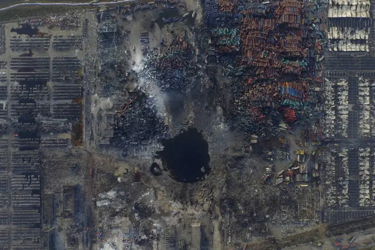 
	Vista a&eacute;rea de Tianjin: as explos&otilde;es foram causadas pela combust&atilde;o de materiais perigosos, armazenados de forma &quot;inadequada e ilegal&quot;
 (Reuters/ Stringer)