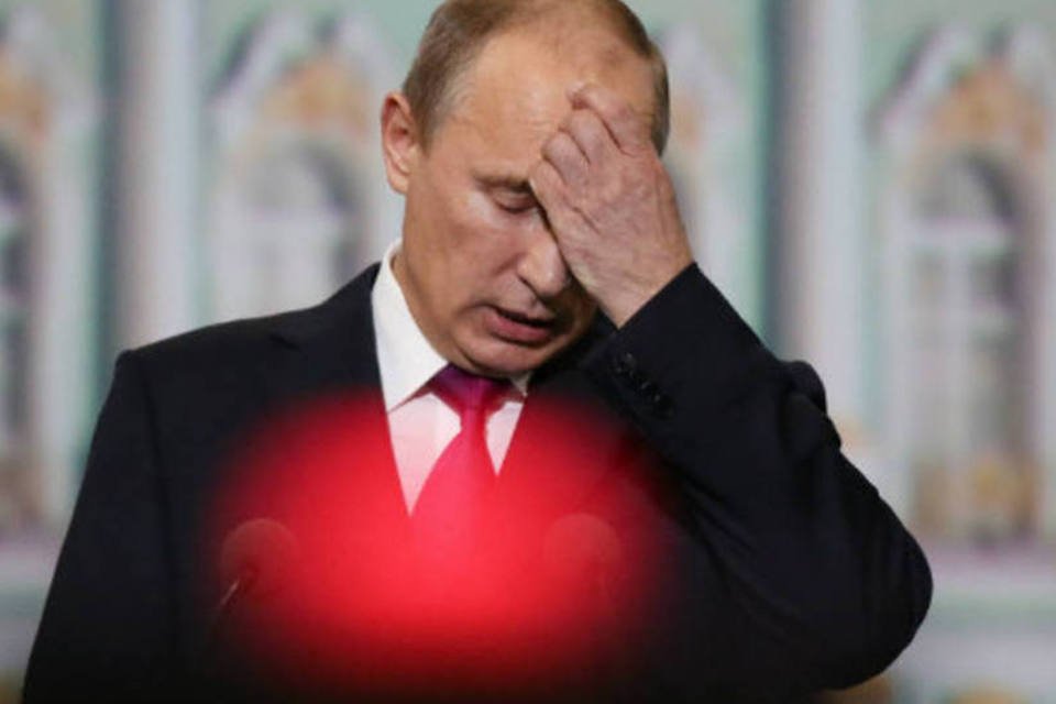 
	Presidente da R&uacute;ssia, Vladimir Putin: a&ccedil;&atilde;o na Ucr&acirc;nia j&aacute; afeta economia
 (Andrey Rudakov/Bloomberg)