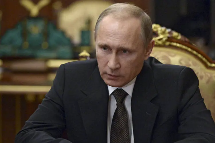 
	Vladimir Putin: o presidente da R&uacute;ssia disse que o trabalho agora &eacute; ajudar familiares de v&iacute;timas de queda de avi&atilde;o
 (Alexei Nikolskyi/SPUTNIK/Kremlin/Reuters)