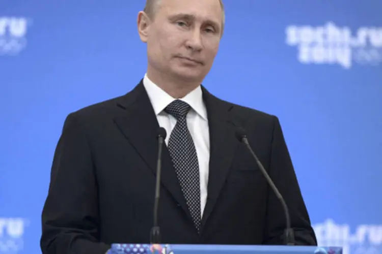 
	Vladimir Putin: &quot;voc&ecirc;s cumpriram a miss&atilde;o que lhes foi solicitada&quot;, disse Putin. &quot;Os resultados obtidos por nossa equipe nacional mostram que deixamos para tr&aacute;s o per&iacute;odo dif&iacute;cil na hist&oacute;ria dos esportes nacionais&quot;
 (Reuters/Alexei Nikolsky)