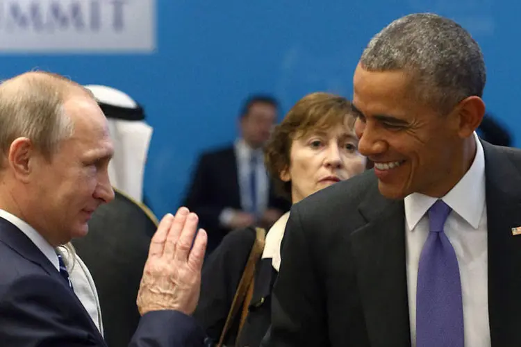 
	Vladimir Putin e Barack Obama: &quot;A quest&atilde;o &eacute; saber como se p&otilde;e fim aos sofrimentos, como se estabiliza a regi&atilde;o&quot;
 (Kayhan Ozer/REUTERS)