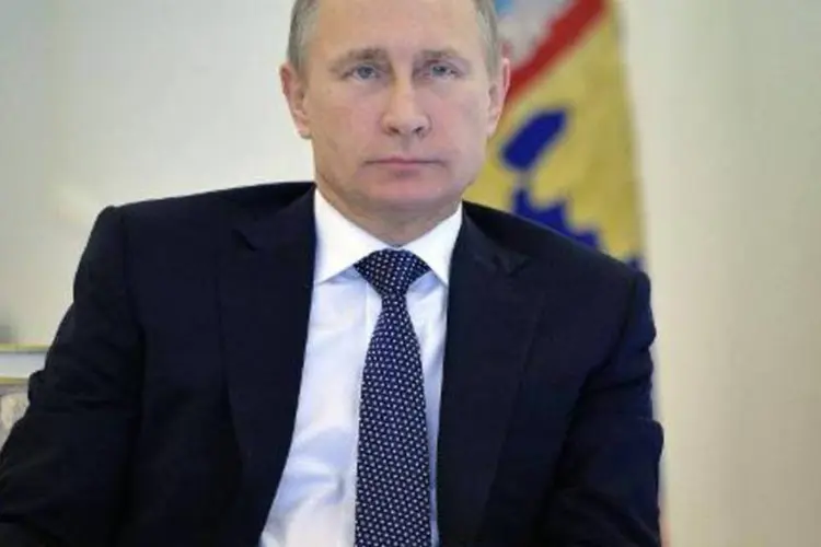 
	O presidente russo Vladimir Putin sobre a anexa&ccedil;&atilde;o da Crimeia: &quot;nossa vantagem foi o fato de ter me dedicado em pessoa a este assunto&quot;
 (Alexey Druzhinin/AFP)