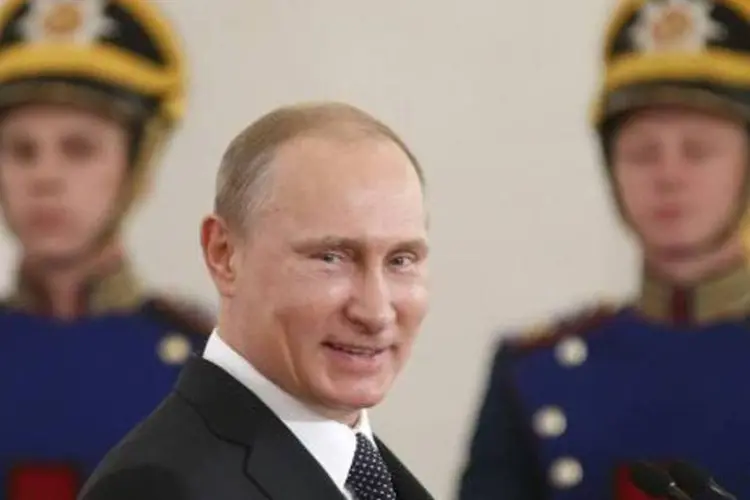 
	O presidente russo, Vladimir Putin: o presidente russo tamb&eacute;m agradeceu os parceiros da R&uacute;ssia que apesar das san&ccedil;&otilde;es continuam trabalhando no pa&iacute;s
 (Maxim Shipenkov/AFP)